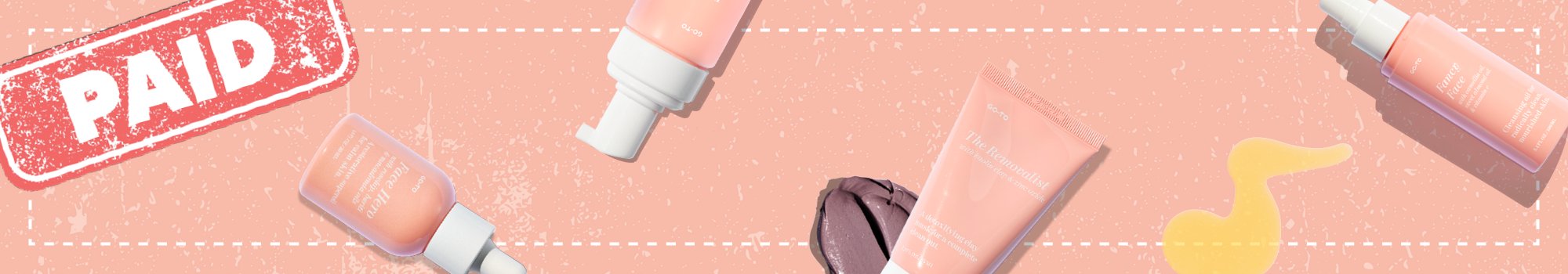 Flat lay of various pink skincare product tubes and bottles on a peach background, with a red PAID stamp in the top left corner and some smears of product.