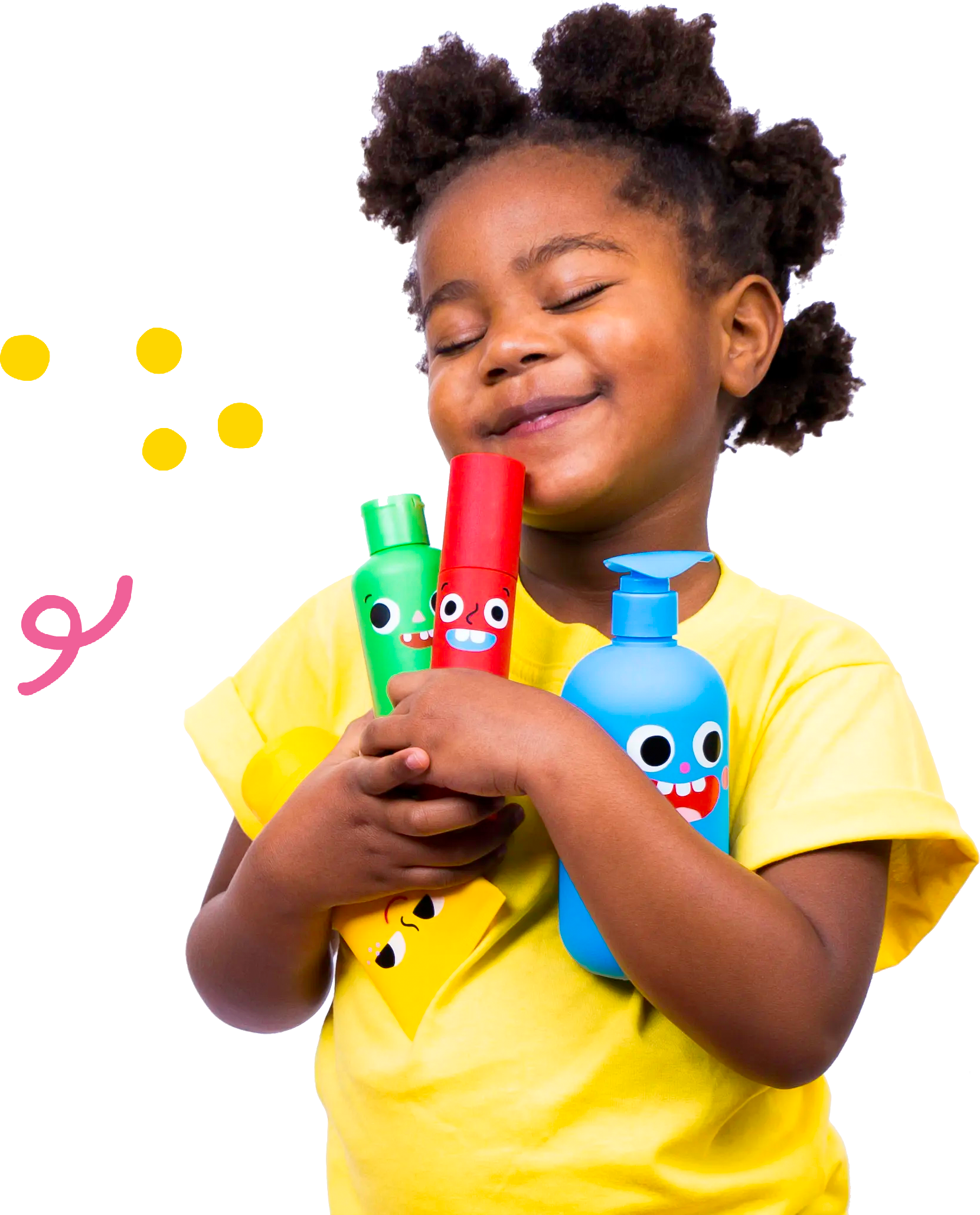 A smiling young child with natural hair hugs colorful bottles with cartoon faces, wearing a bright yellow shirt. The background is white with playful yellow dots and a pink squiggle.