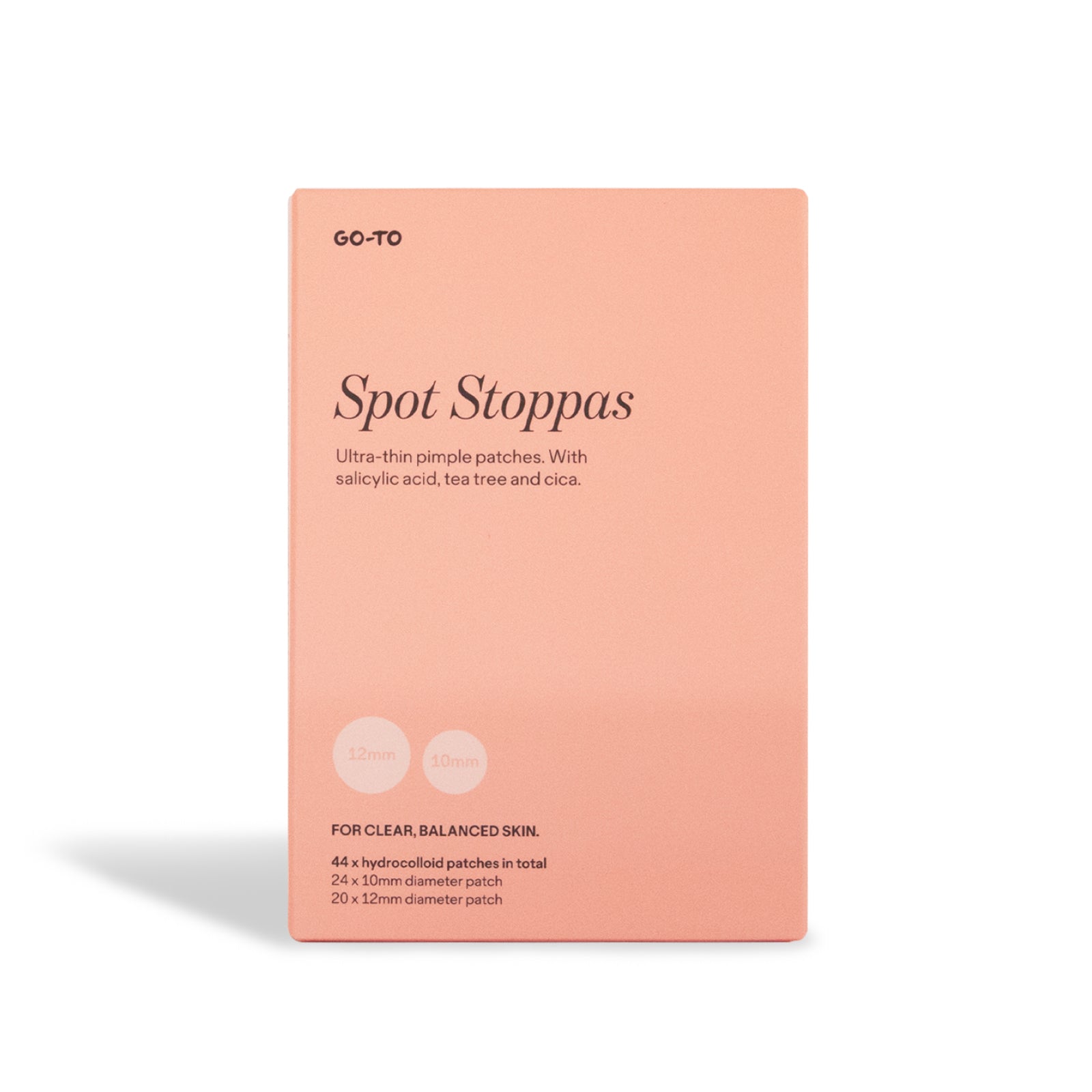 A peach box labeled “Spot Stoppas” by Go-To Skincare, featuring 44 ultra-thin hydrocolloid pimple patches with salicylic acid, tea tree, and cica—24 small and 20 large—for targeted spot treatment.