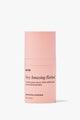 A bottle of Go-To Properly Clean facial cleanser featuring its signature peachy-pink packaging and pump dispenser.