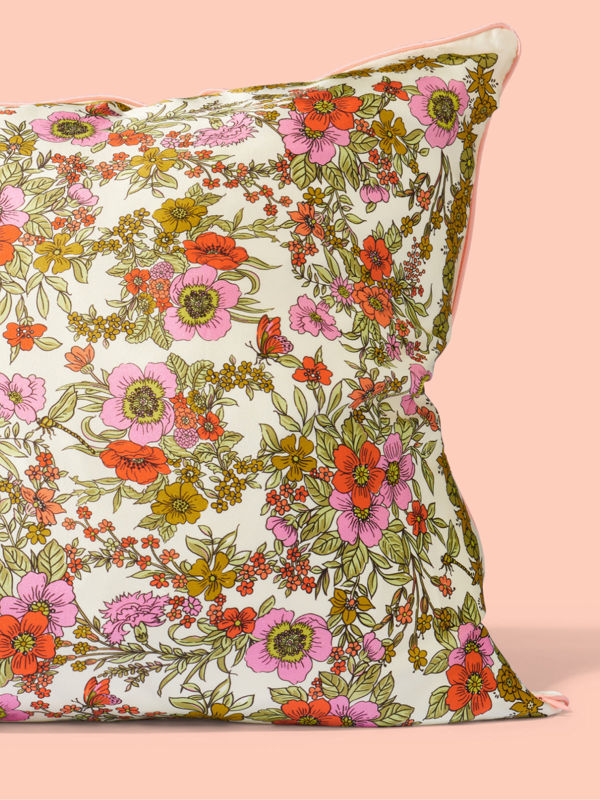 Sweet Sleeps floral silk pillowcase with pink orange and yellow flowers on a cream background from Go-To Skincare